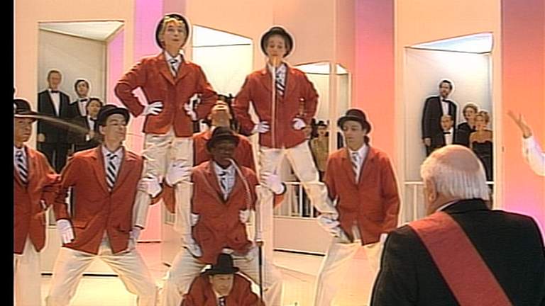 Entertainers attempt to amuse the prince with a 'human fountain'.